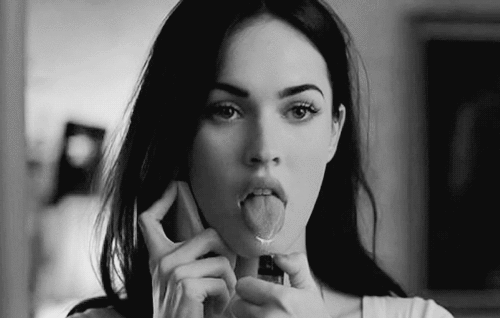 megan fox burning her tongue with lighter scene black and white