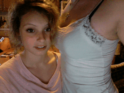 teen girl biting friends boob non nude